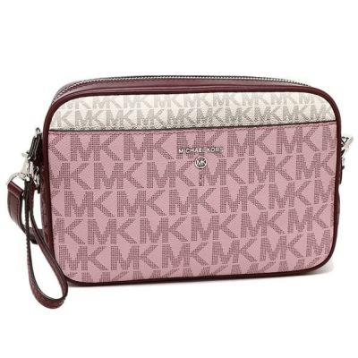 Kelsey signature east discount west small crossbody